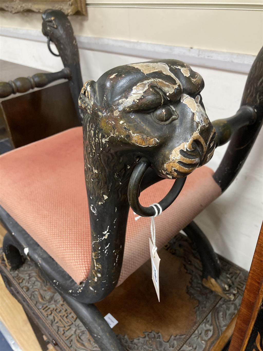 A Regency brass X frame dressing stool, from a design by Thomas Hope, width 88cm, depth 48cm, height 76cm